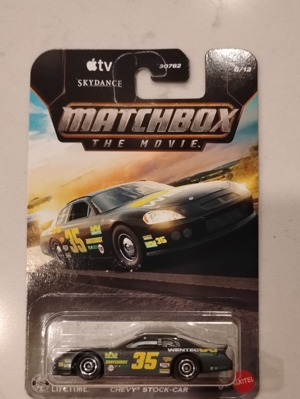 Mattel Matchbox Black and Yellow Chevy Stock-Car Toy in Blister Pack